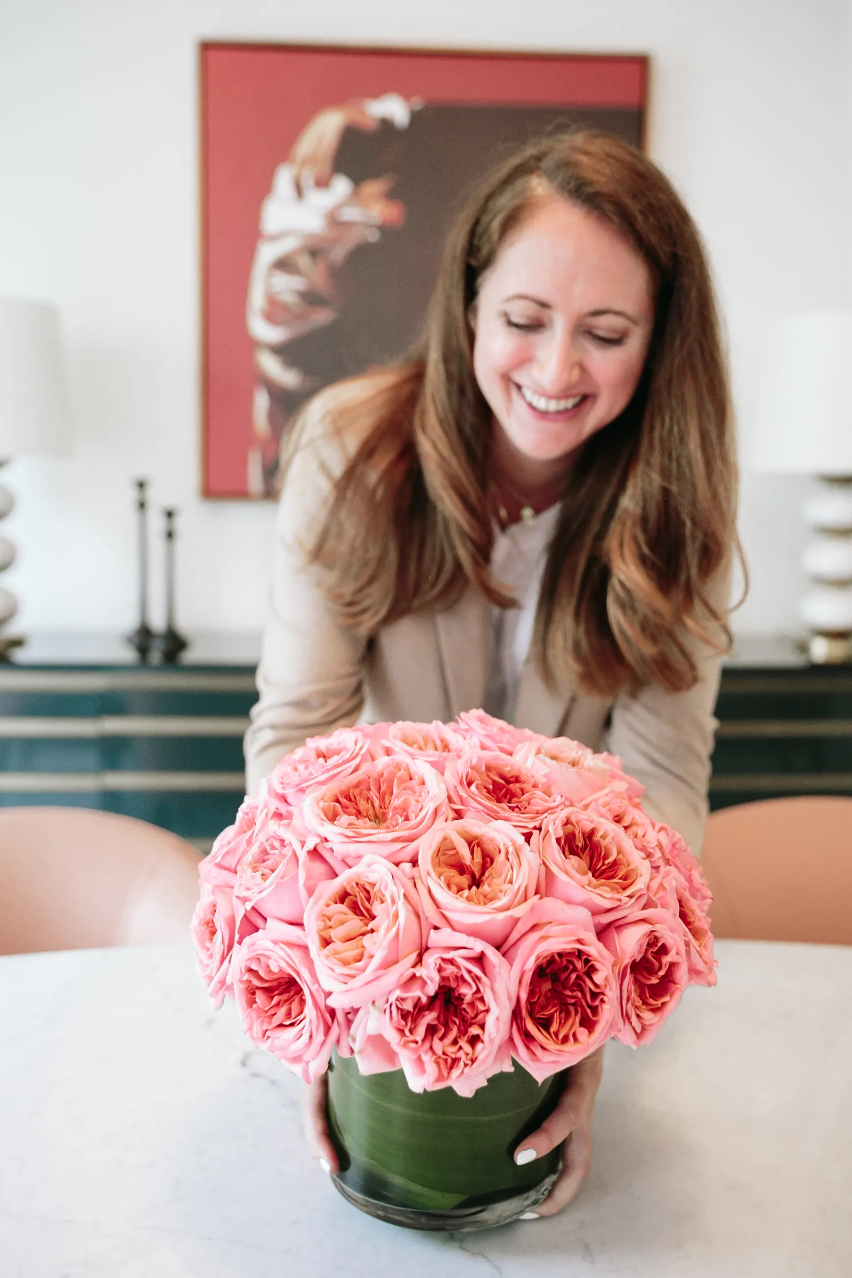 Anina Giannini arranging a bouquet of garden roses at the Four Seasons