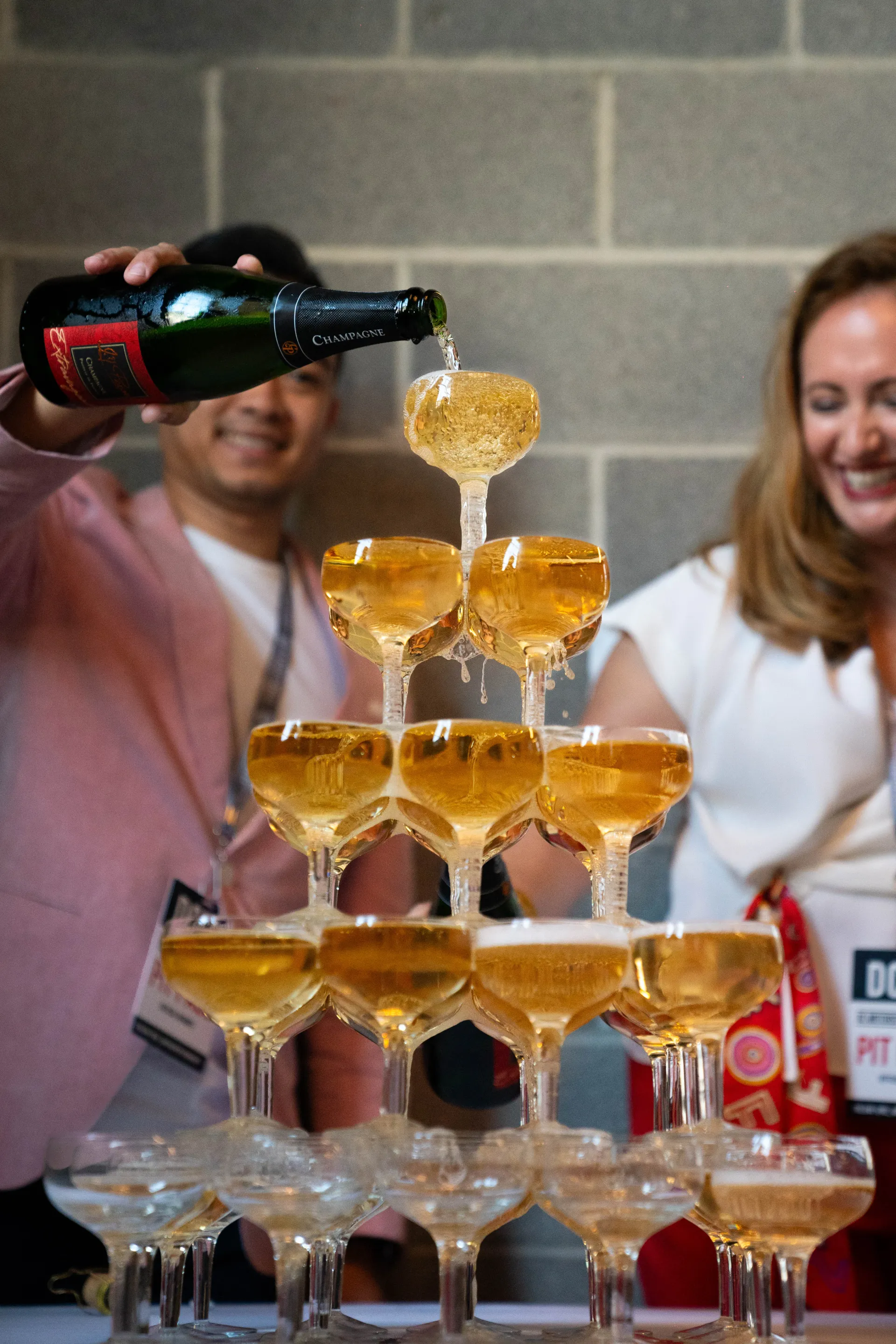 Champagne tower at a DC Motorsport Community Monaco Grand Prix watch party